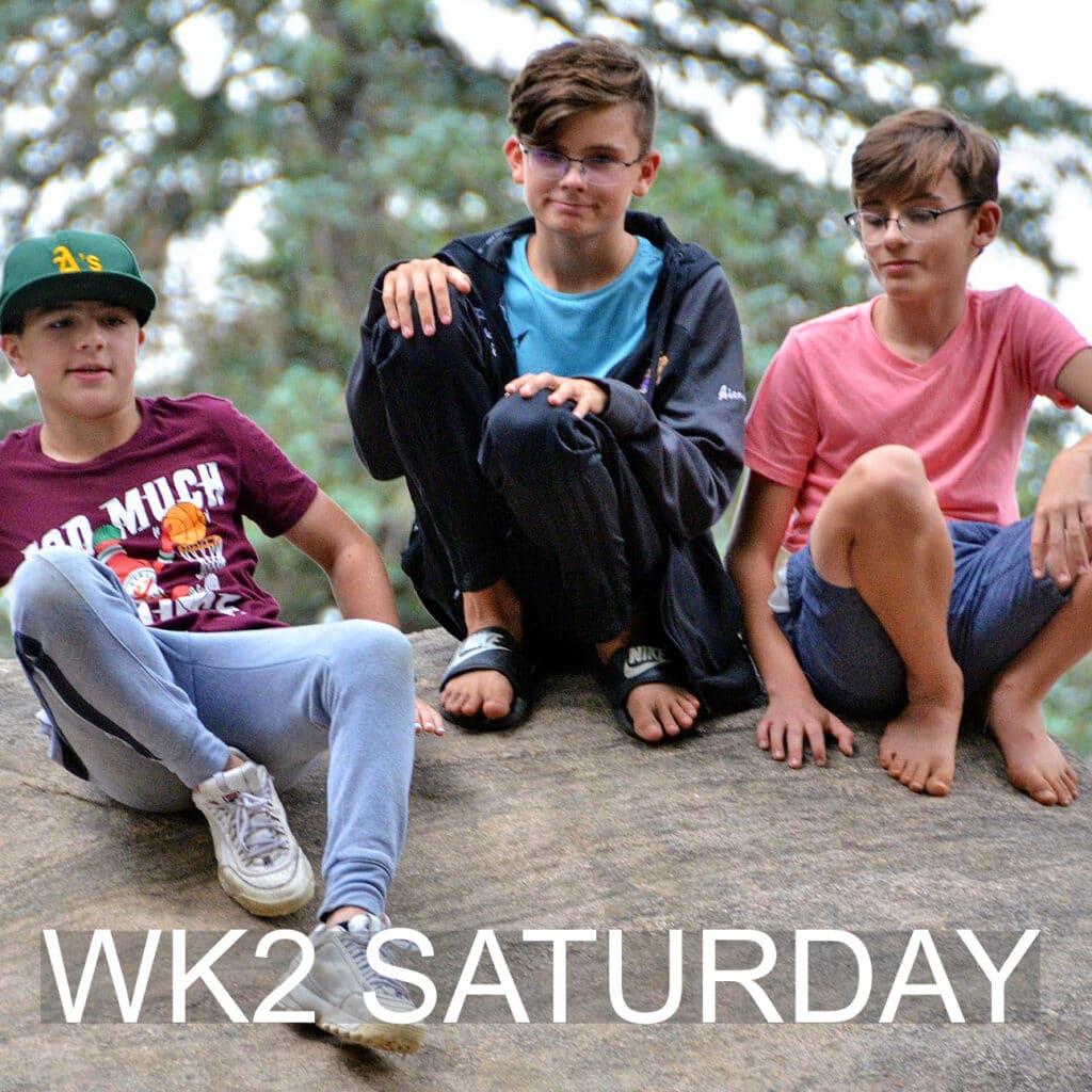 Friends sitting together outdoors on a relaxed Saturday.