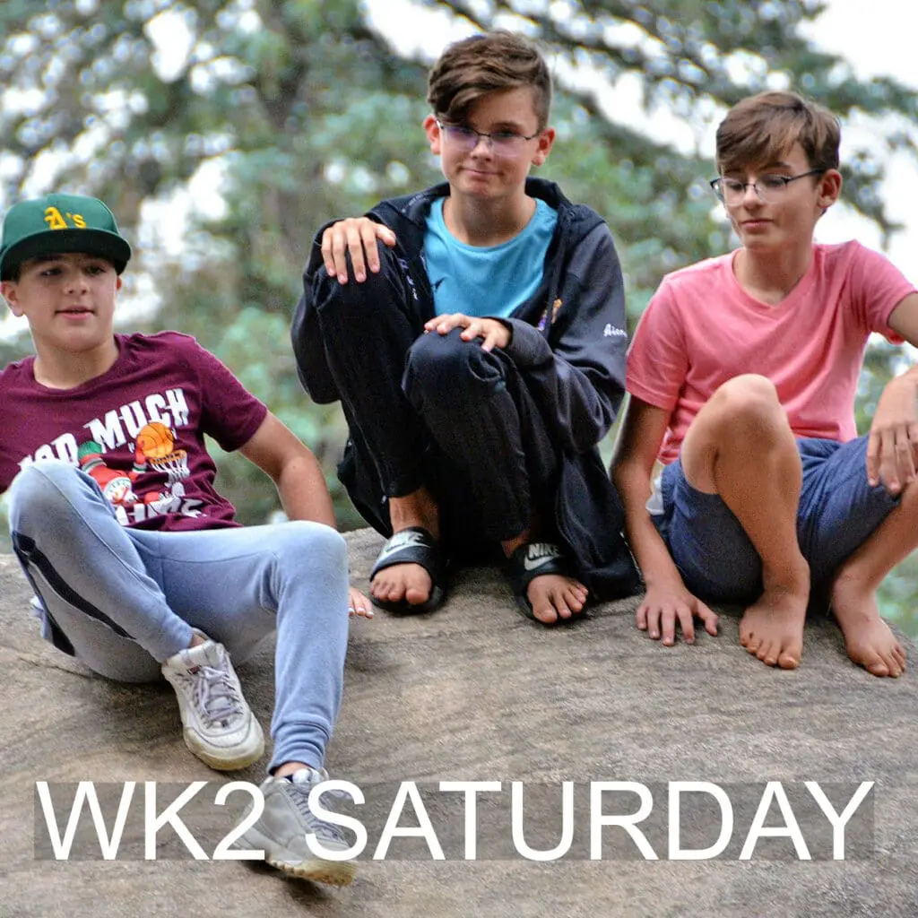 Friends sitting together outdoors on a relaxed Saturday.