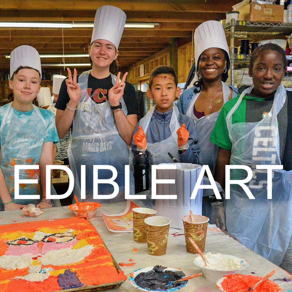 Creative edible art session with kids decorating treats.