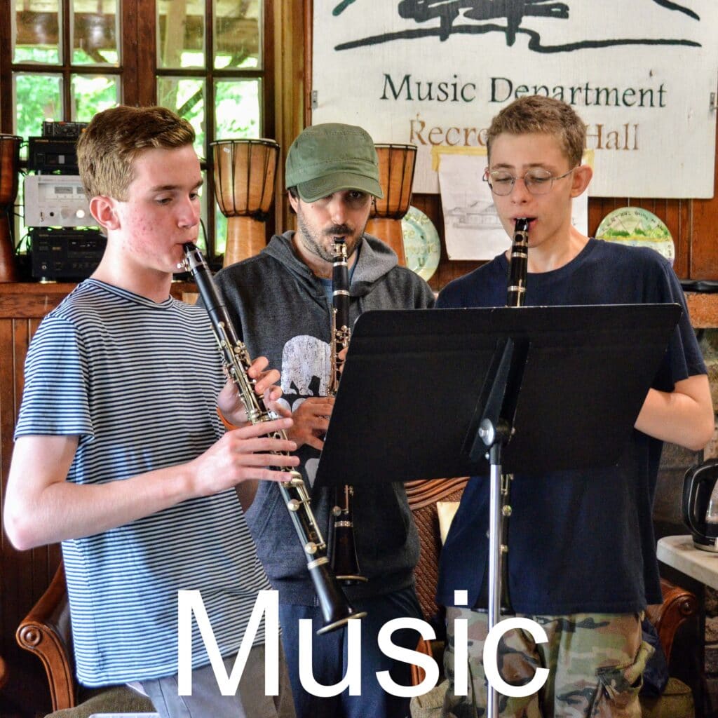 Campers playing instruments during music program at Long Lake Camp.