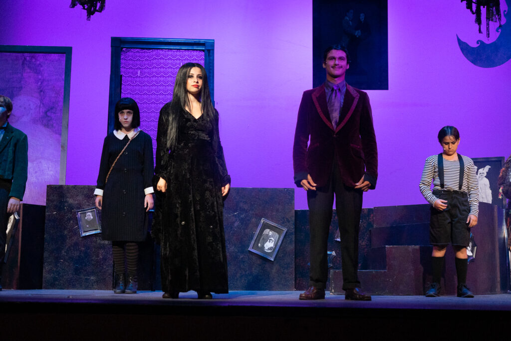 Addams Family youth cast singing at Long Lake Camp for the Arts