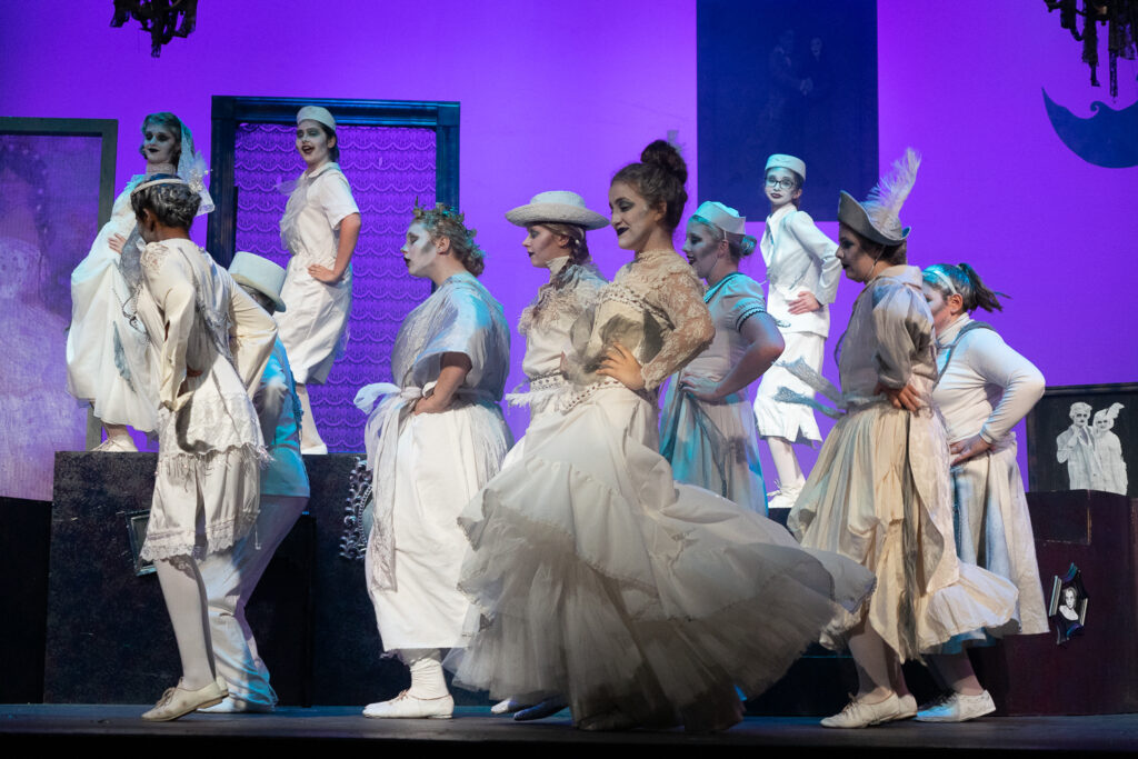 Long Lake Camp for the Arts actors in colorful Addams Family costumes