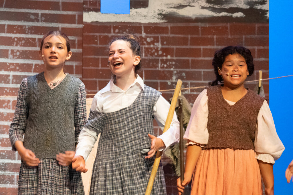 Annie drama scene with performers from Long Lake Camp for the Arts