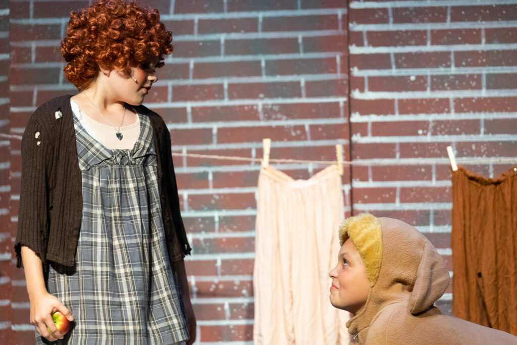 Annie cast onstage at Long Lake Camp for the Arts