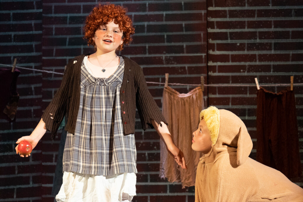 Long Lake Camp for the Arts youth performing an Annie scene