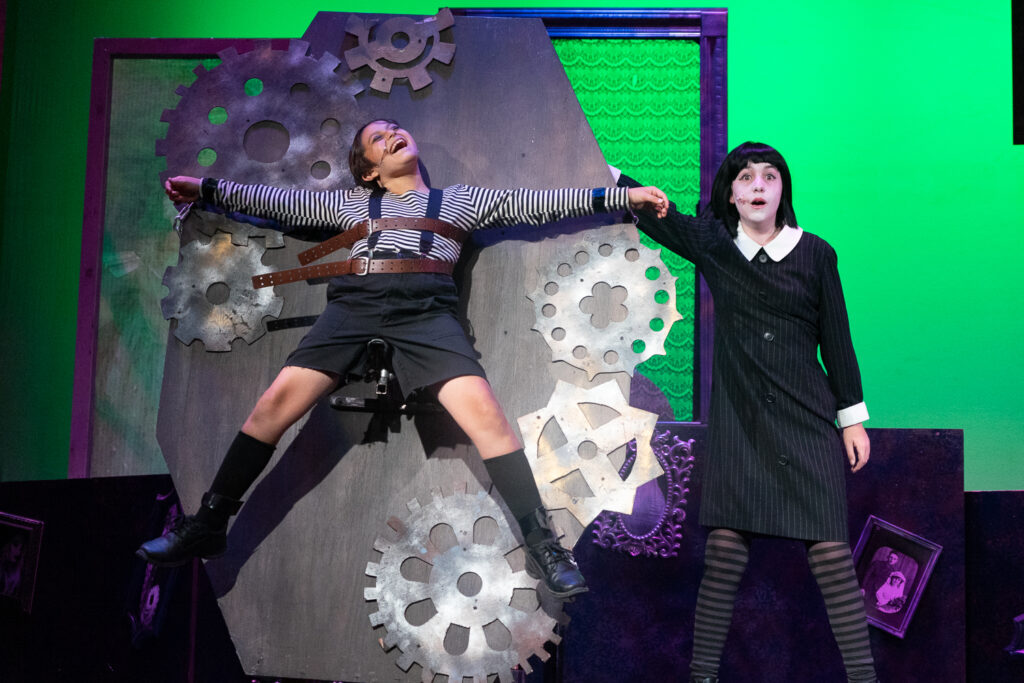Addams Family ensemble cast performing at Long Lake Camp for the Arts