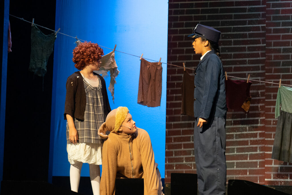 Long Lake Camp for the Arts scene featuring Annie cast