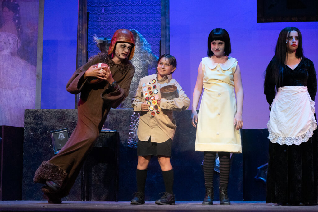 Long Lake Camp for the Arts Addams Family musical cast onstage