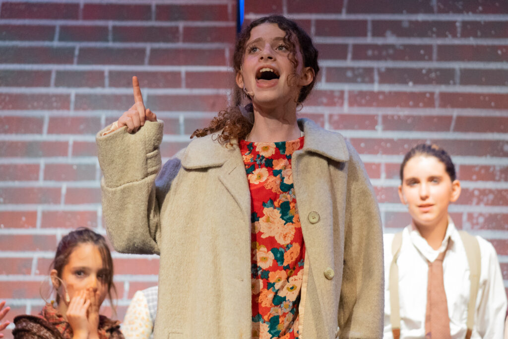 Long Lake Camp for the Arts youth performing Annie