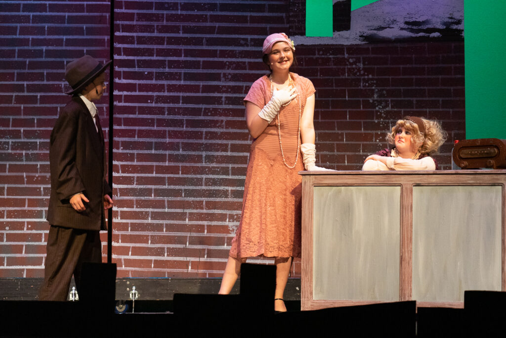 Campers acting in Annie at Long Lake Camp for the Arts
