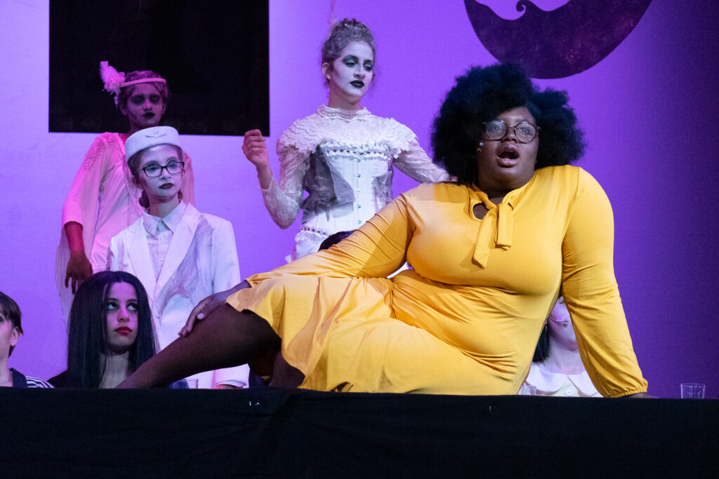 Long Lake Camp for the Arts young actors portraying Addams Family roles