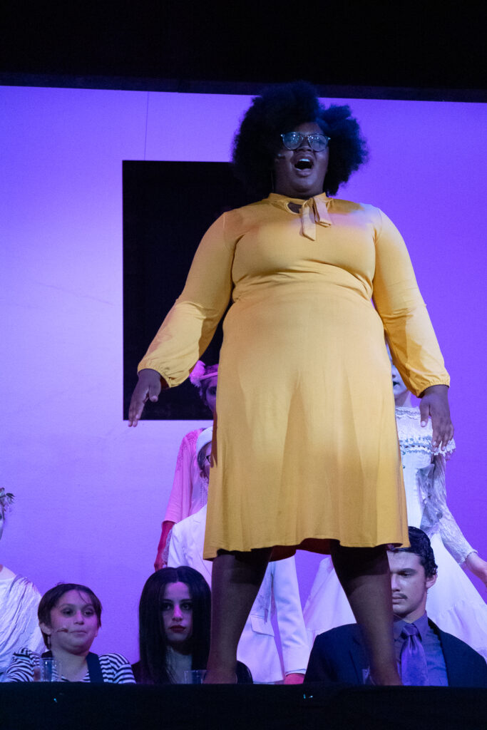 Addams Family cast members onstage at Long Lake Camp for the Arts