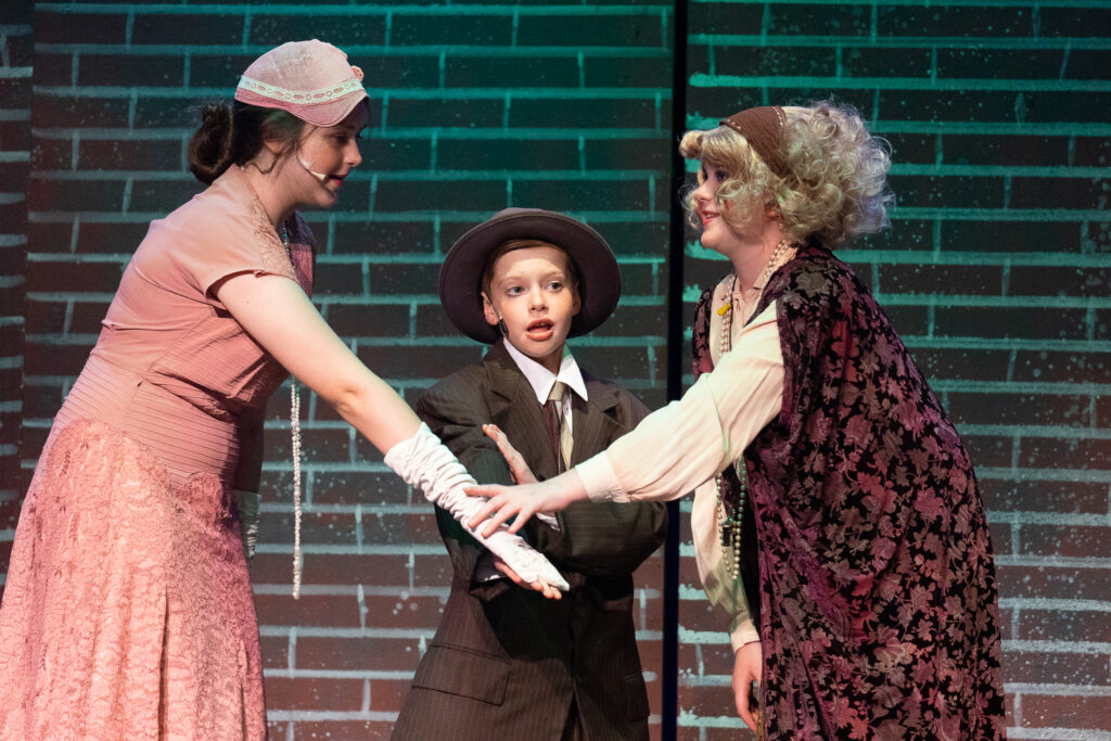 Campers acting in Annie at Long Lake Camp for the Arts