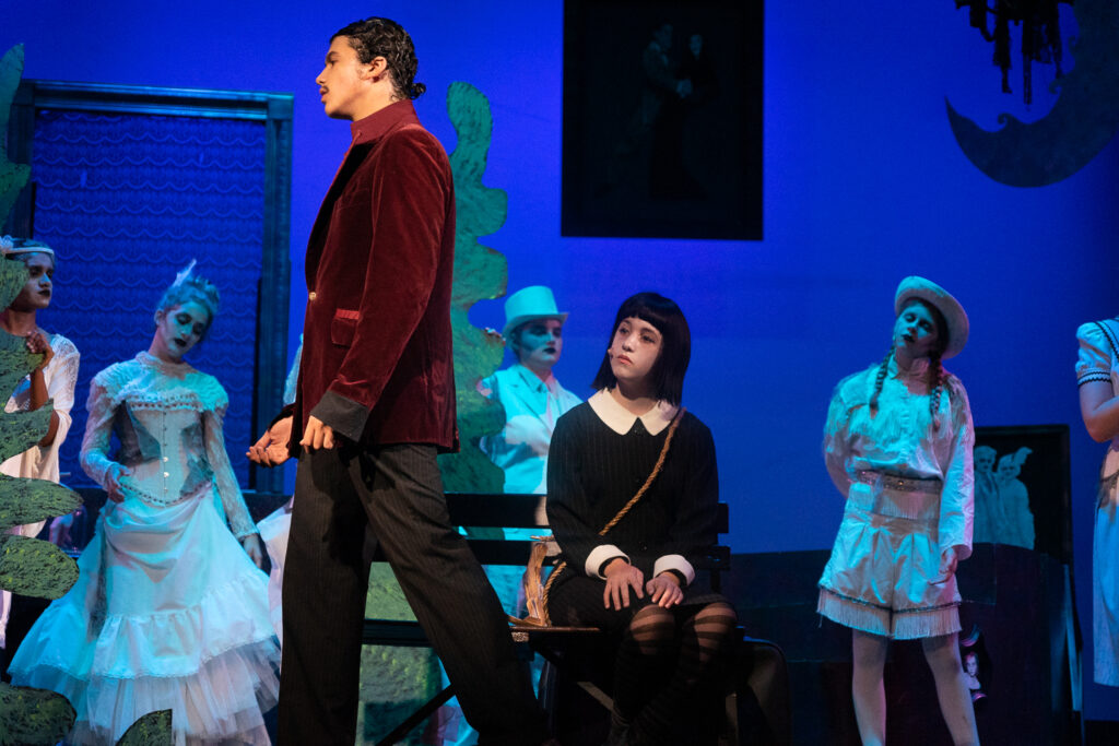 Long Lake Camp for the Arts staging a lively Addams Family scene