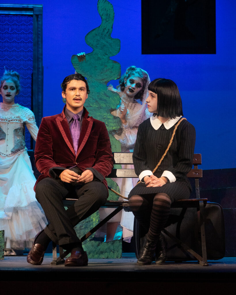 Long Lake Camp for the Arts campers in a dramatic Addams Family scene