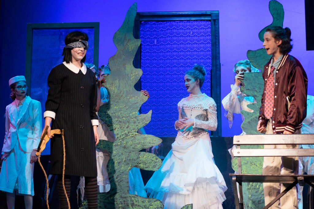 Long Lake Camp for the Arts youth cast performing Addams Family scene