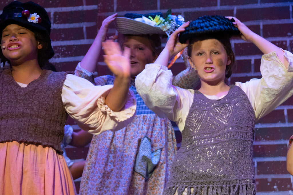 Annie theatrical moment captured at Long Lake Camp for the Arts