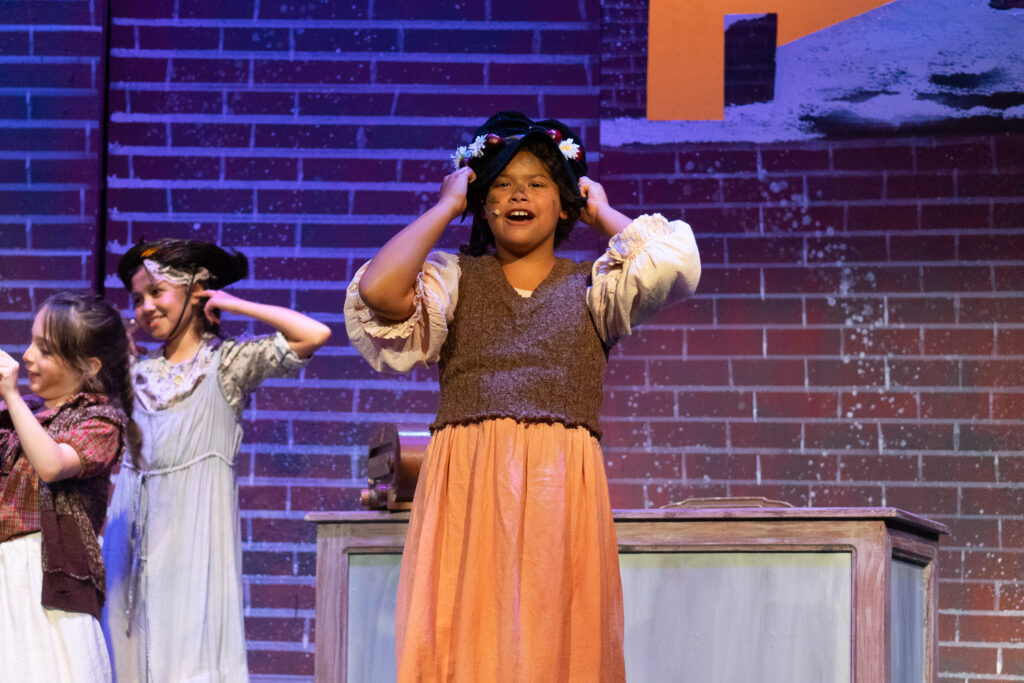 Long Lake Camp for the Arts youth ensemble in Annie show
