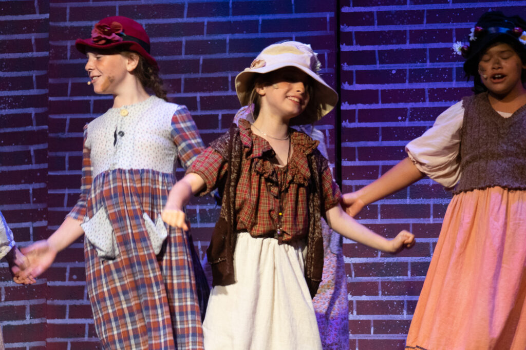 Long Lake Camp for the Arts youth ensemble in Annie show