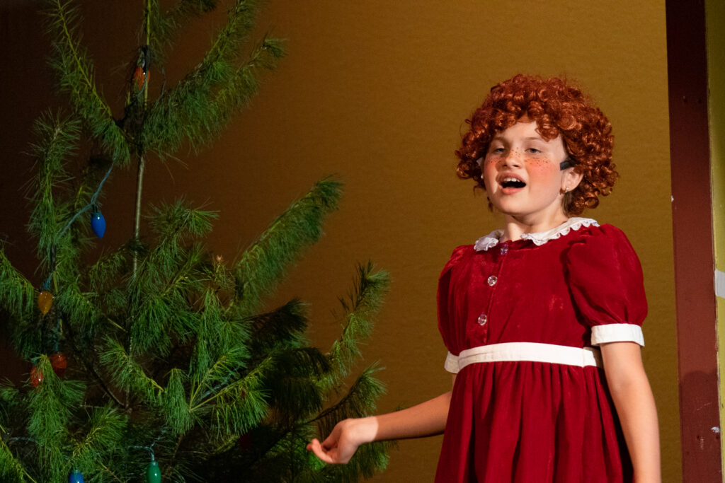 Annie actors on stage during Long Lake Camp for the Arts show