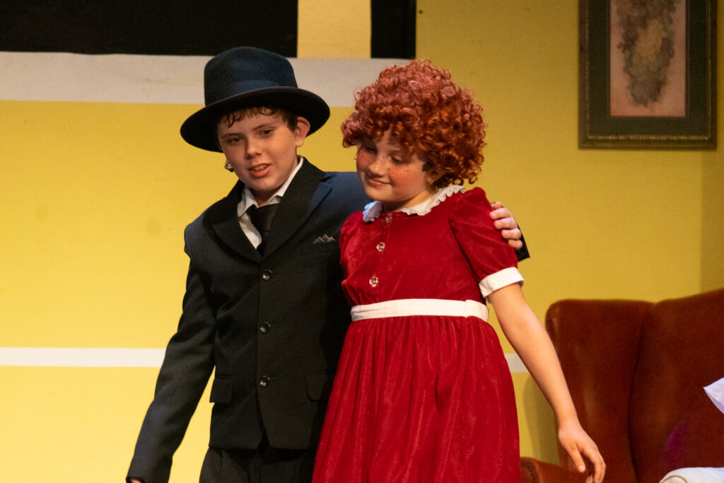 Annie cast onstage at Long Lake Camp for the Arts