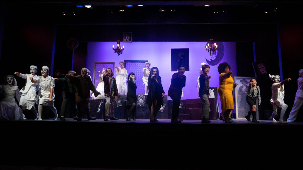 Addams Family characters onstage at Long Lake Camp for the Arts