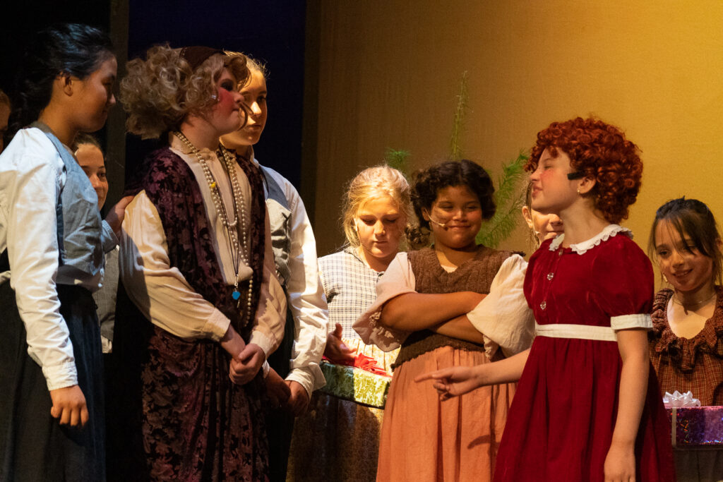 Long Lake Camp for the Arts youth performing an Annie scene