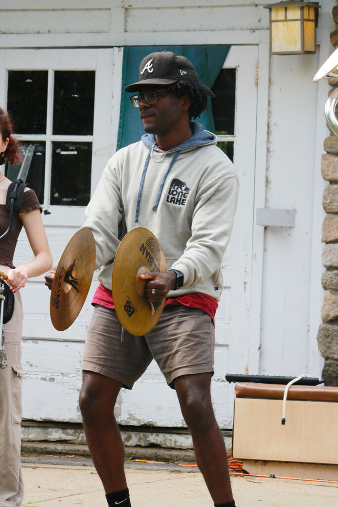 Percussionist rehearsing cymbals during extravaganza practice