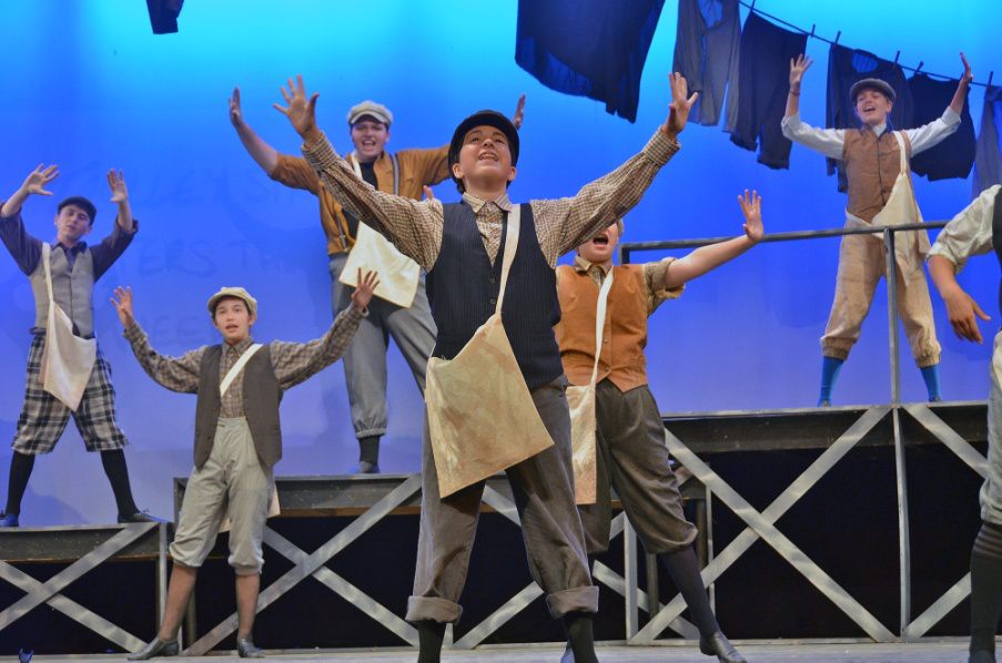teen-boys-confident-stage-performance – Long Lake Camp For The Arts Teen boys confidently performing on stage during a theater showcase.