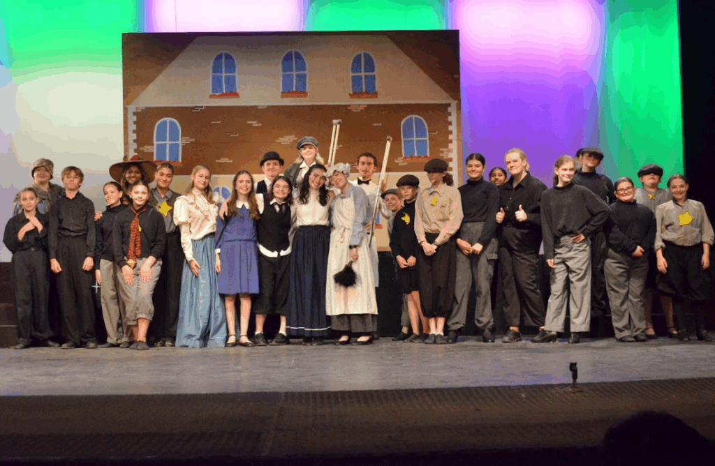 mary-poppins-full-cast-final-performance – Long Lake Camp For The Arts The entire cast of Mary Poppins standing together on stage at curtain call after a successful performance