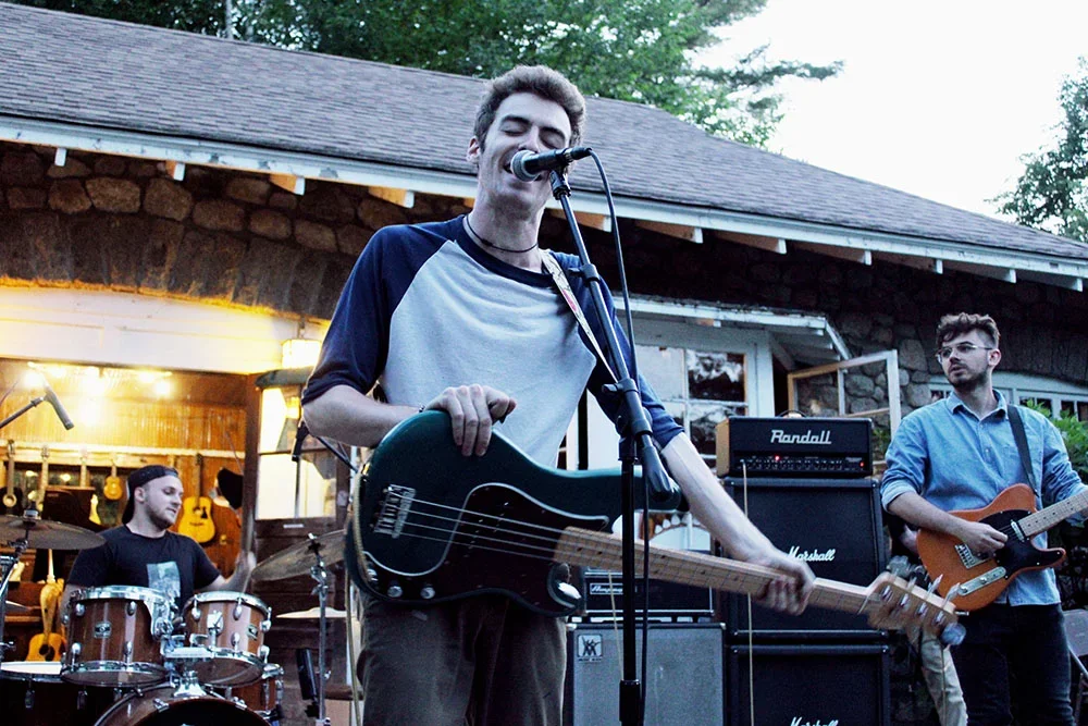 teen-musicians-rehearsing-summer-music-camp- – Long Lake Camp For The Arts Teen musicians rehearsing and performing with confidence at summer music camp.
