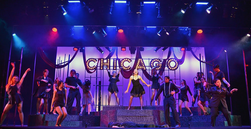 campers-chicago-spotlights – Long Lake Camp For The Arts Campers performing a scene from Chicago with professional spotlighting on stage