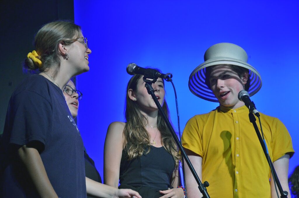 teenagers-microphonesDSC_8175 – Long Lake Camp For The Arts A group of teenagers singing into a microphone