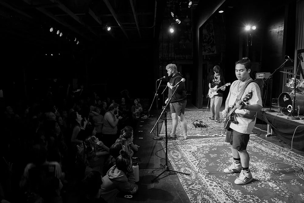 EA3A9350 – Long Lake Camp For The Arts Campers performing on stage during Rock Night with their instruments in front of an audience