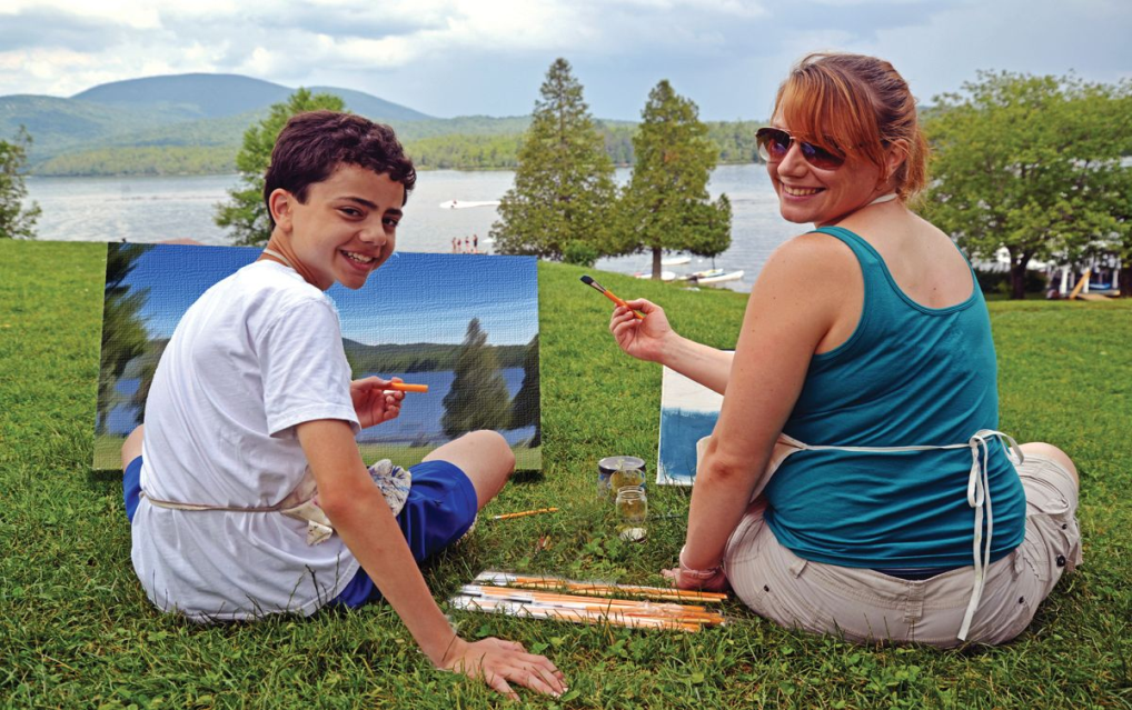 camper-painting-with-supervisor – Long Lake Camp For The Arts Camper painting with supervisor guidance