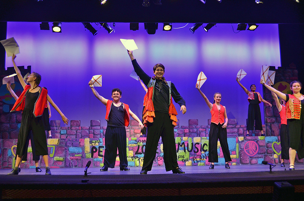 musical-theater-group-finale-on-stage – Long Lake Camp For The Arts Teens performing a finale number at a performing arts summer camp production