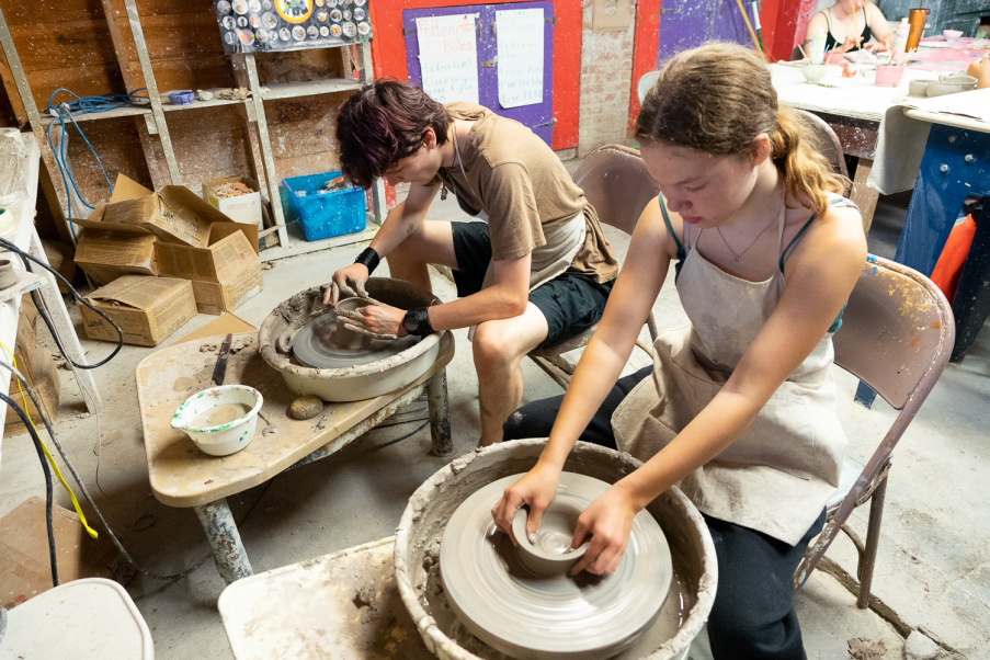 Picture14 – Long Lake Camp For The Arts Teen campers working on pottery in a ceramics studio
