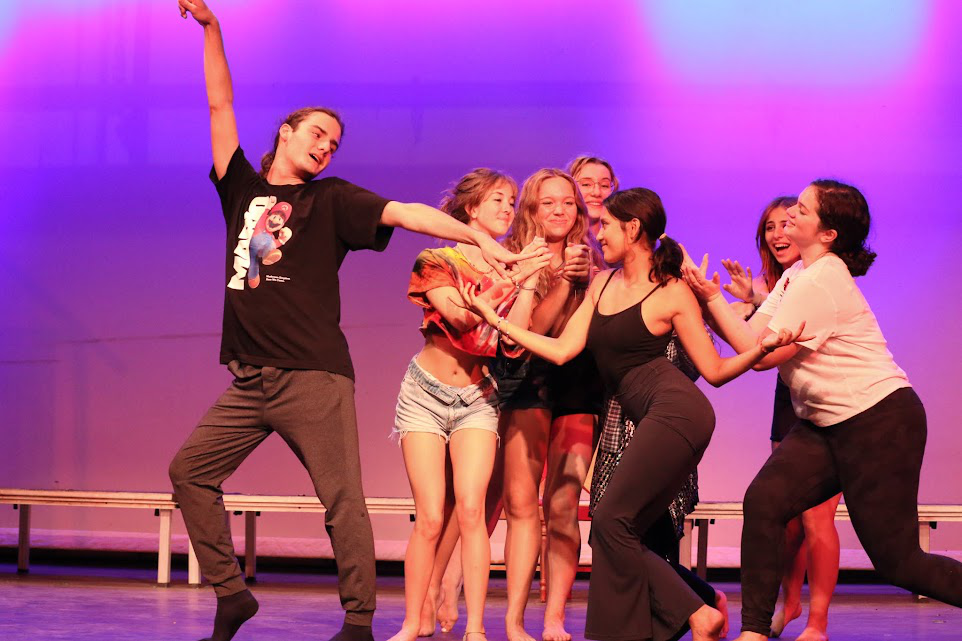 Picture18 – Long Lake Camp For The Arts Teen dancers rehearsing a choreographed sequence together on stage during camp