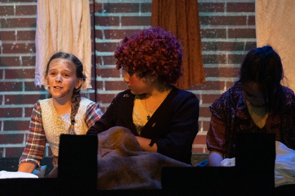 Picture22 – Long Lake Camp For The Arts Teens performing the musical Annie on stage at a musical theatre camp