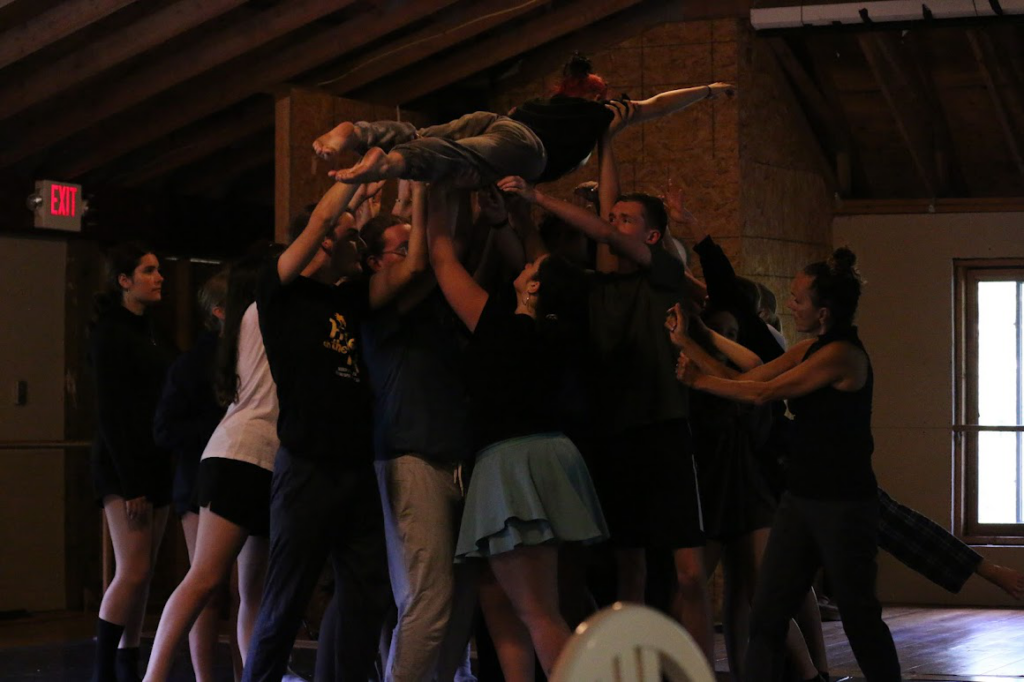 Picture25 – Long Lake Camp For The Arts A group of campers practicing a coordinated movement sequence together