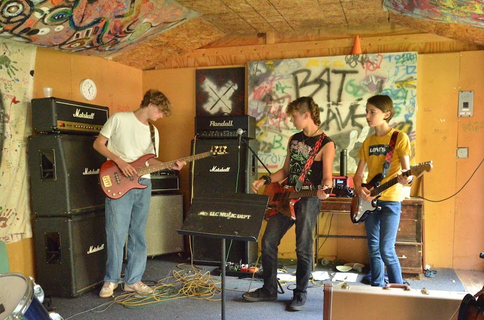 Picture9 – Long Lake Camp For The Arts Teens playing instruments together during a collaborative music session at camp