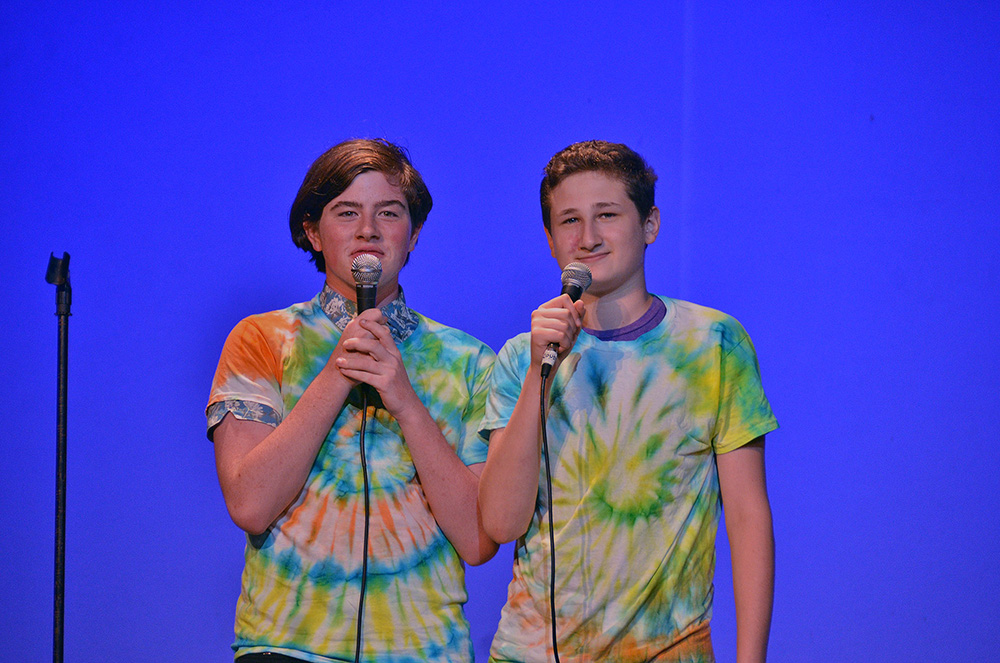 Picture49 – Long Lake Camp For The Arts Teenager performing on stage