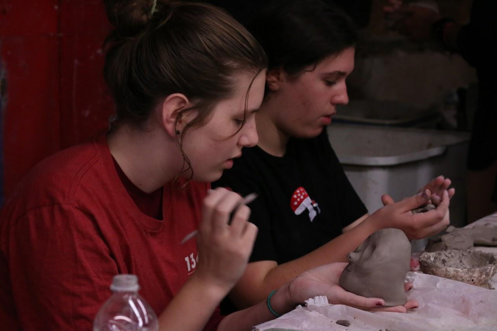 Picture25 – Long Lake Camp For The Arts Campers shaping clay pottery and ceramic projects in a studio