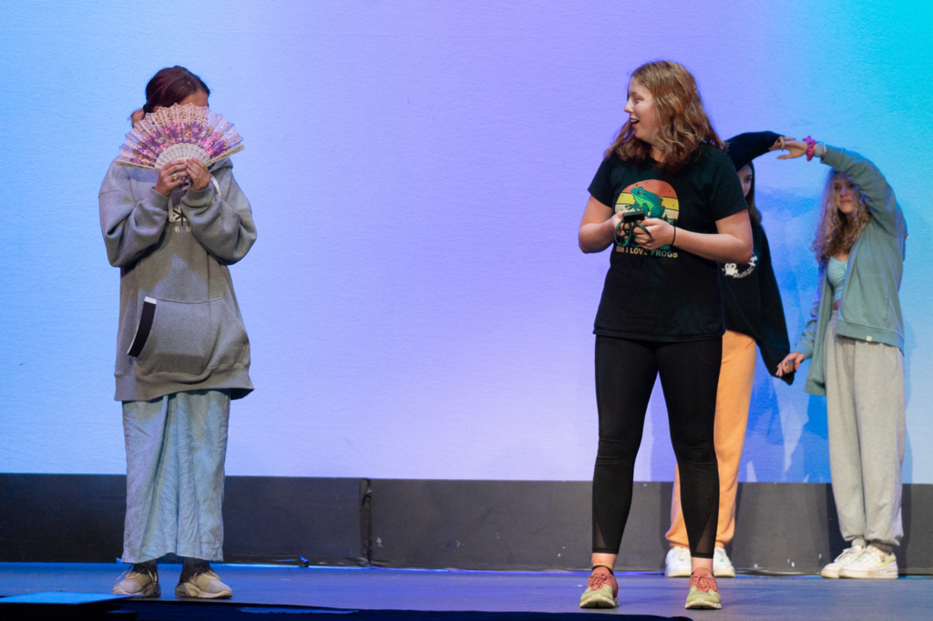 Picture18 – Long Lake Camp For The Arts Young campers rehearsing a theater production on stage