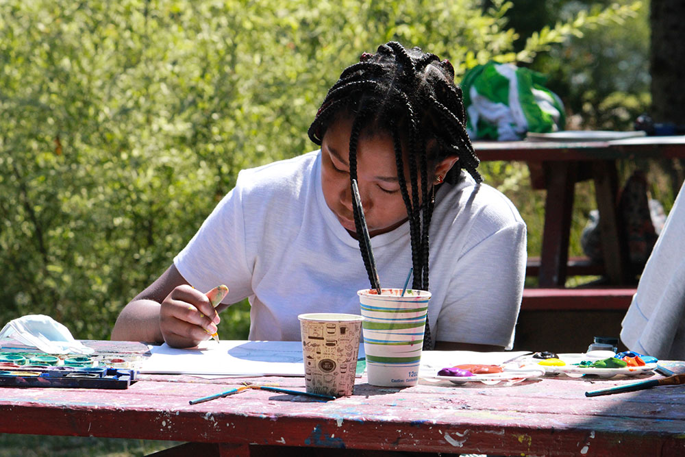 Picture20 – Long Lake Camp For The Arts Teen painting during a studio session at arts camp
